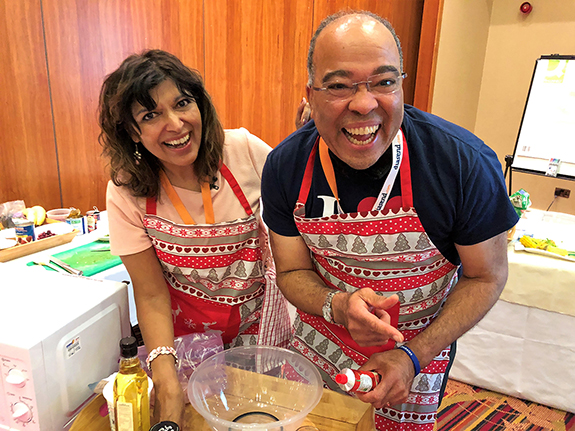 Lynwood and Azmina Govindji at a cooking demonstration. 