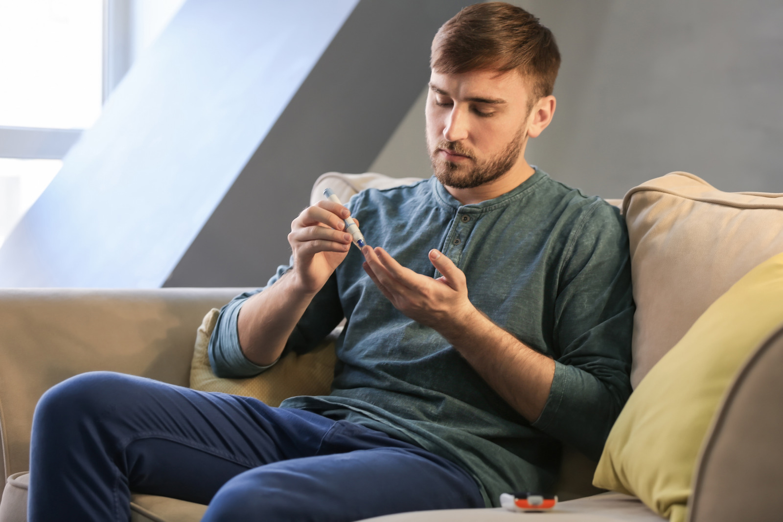 A man checking his blood sugar levels. 