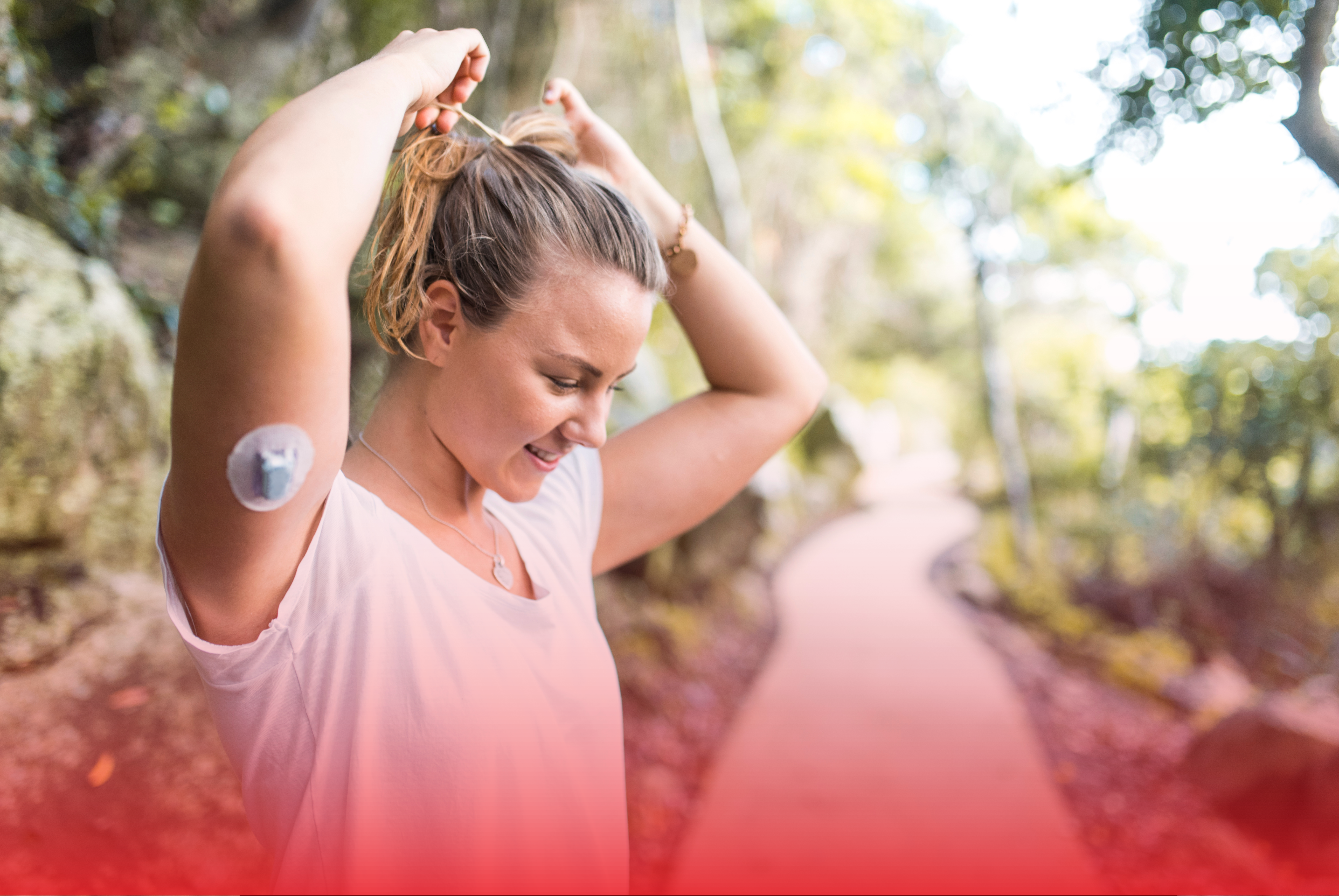 Woman With Dexcom CGM On Arm Banner