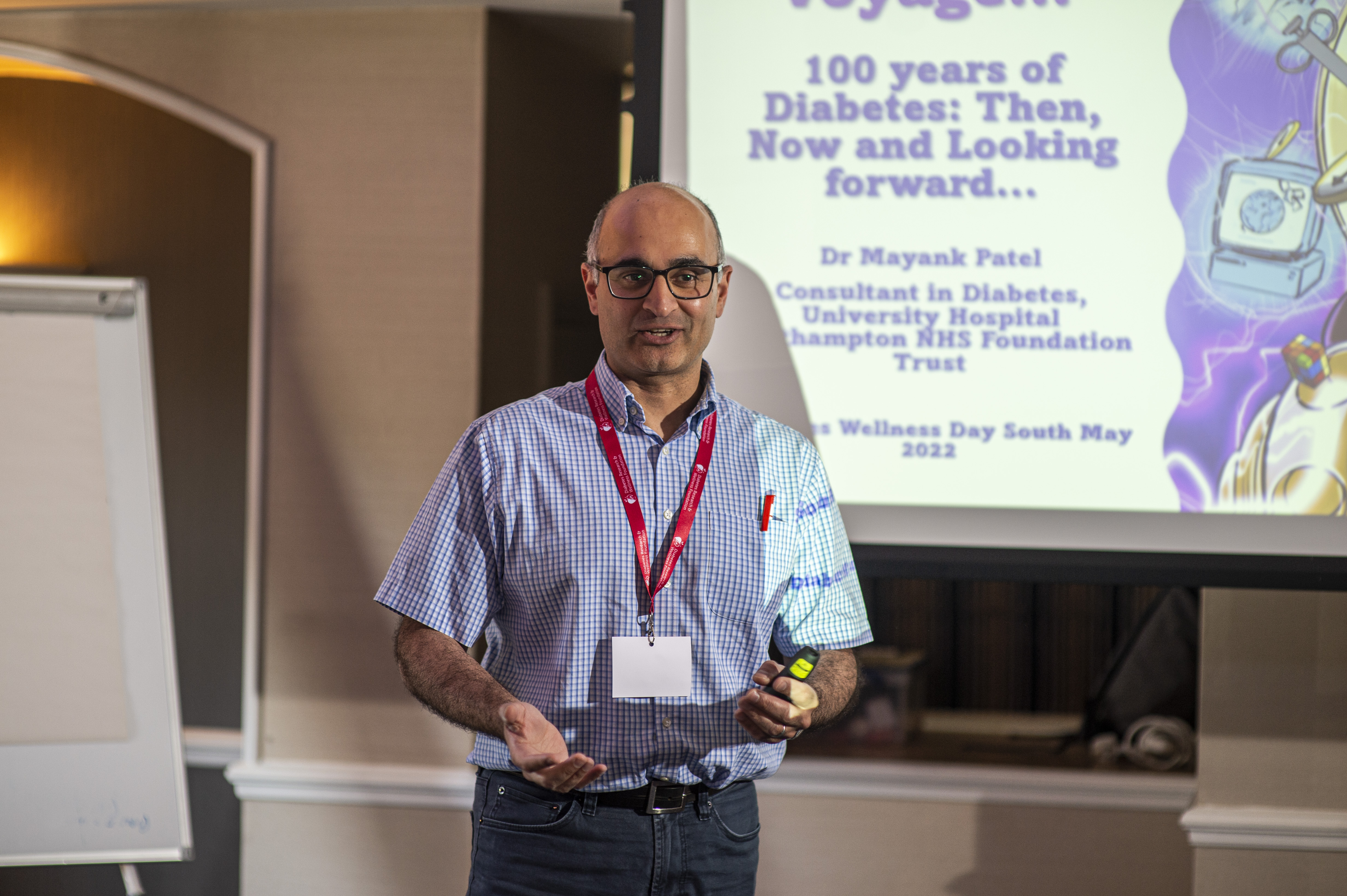 Dr Mayank Patel talking at our wellness day. 