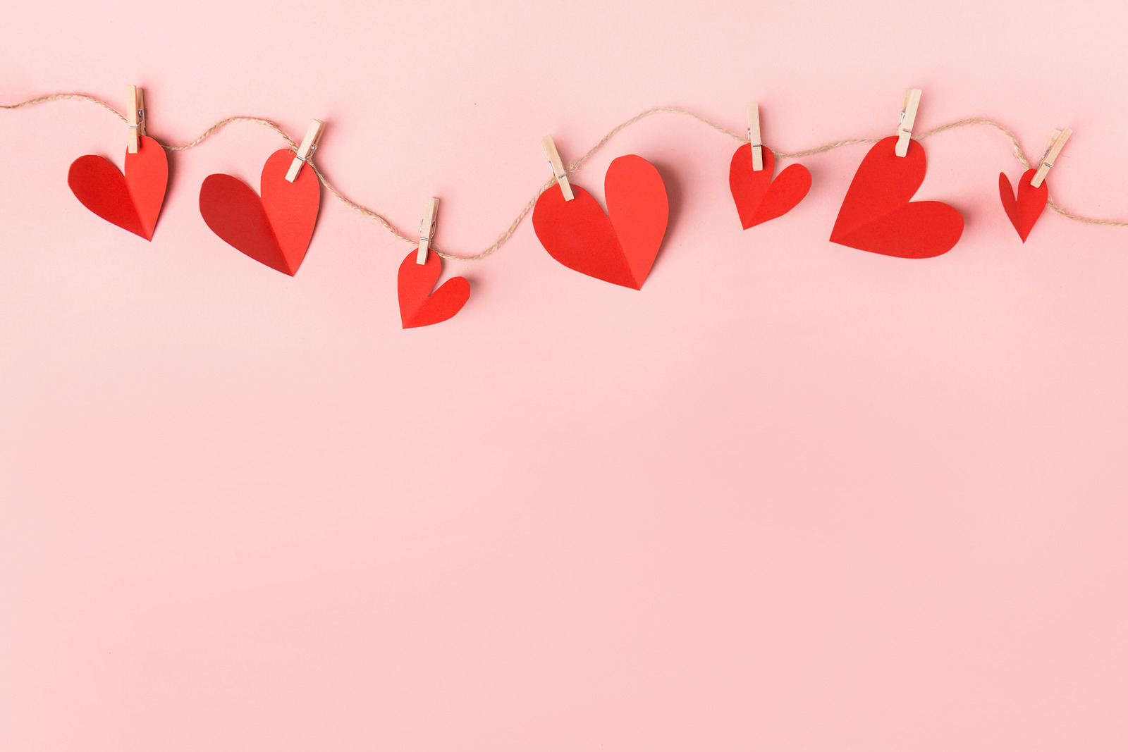 Red Hearts On Pink Background