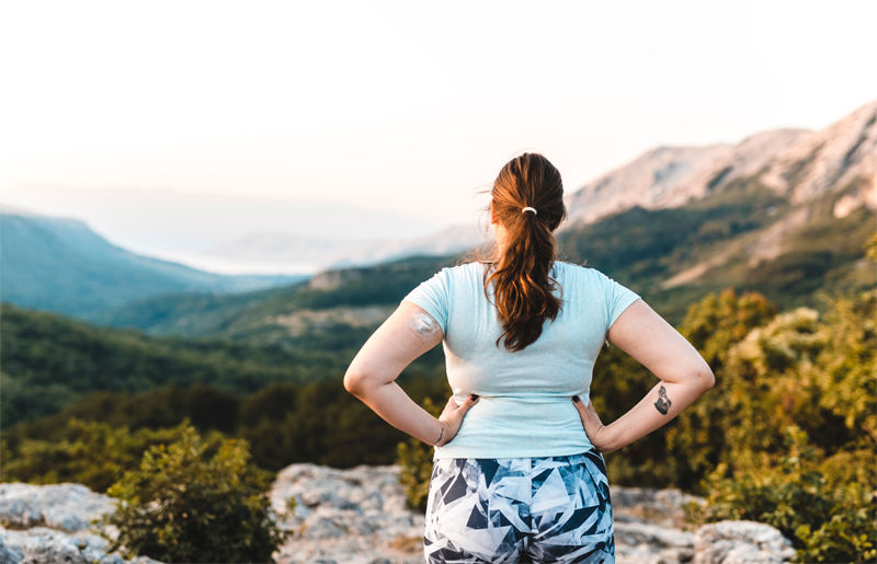 Woman Using CGM On A Hike R