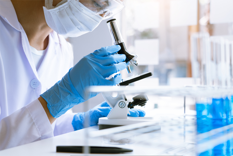 Medical Researcher Microscope R